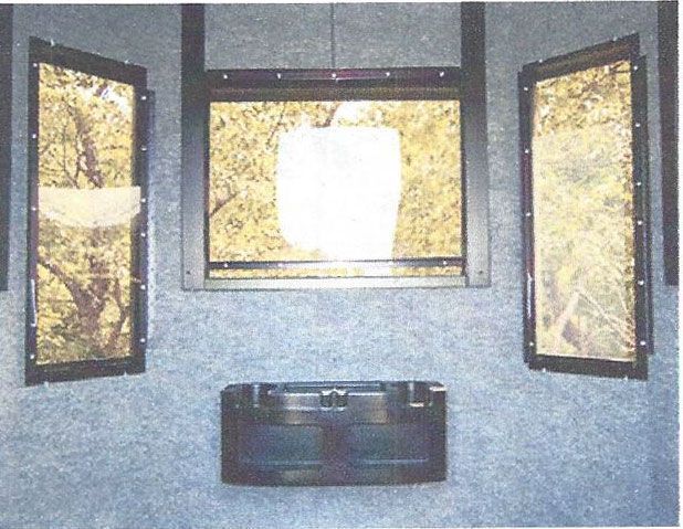 Fully Carpeted Hunting Blind Interior With Windows And Accessory Shelf