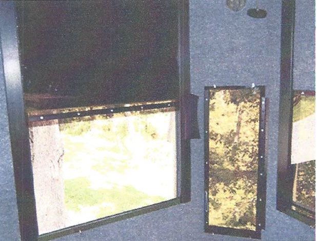 Fully Carpeted Hunting Blind Interior With Open Window