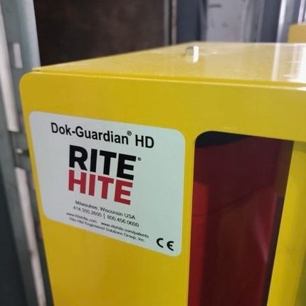 Yellow Dok-Guardian HD container with Rite Hite logo. Shows red and black accents.