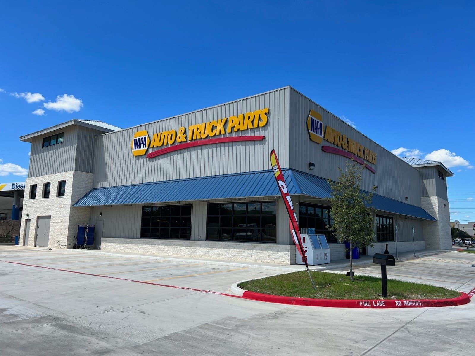 A staircase with a christmas garland on the railing