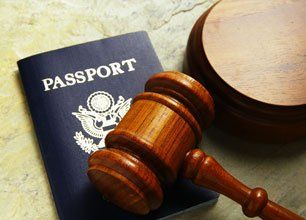 Passport and gavel on a table