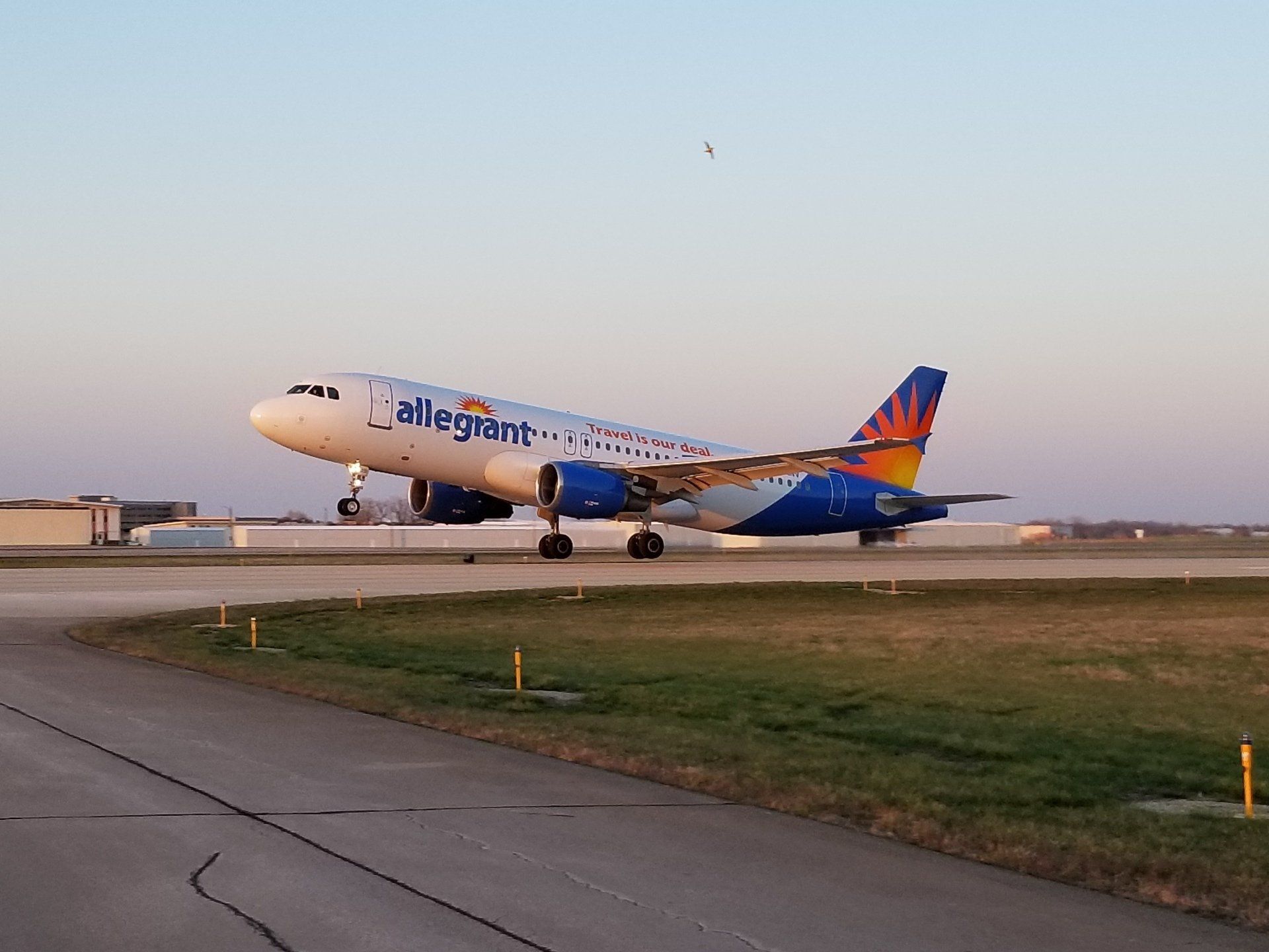 An allegiant airlines plane is sitting on the runway