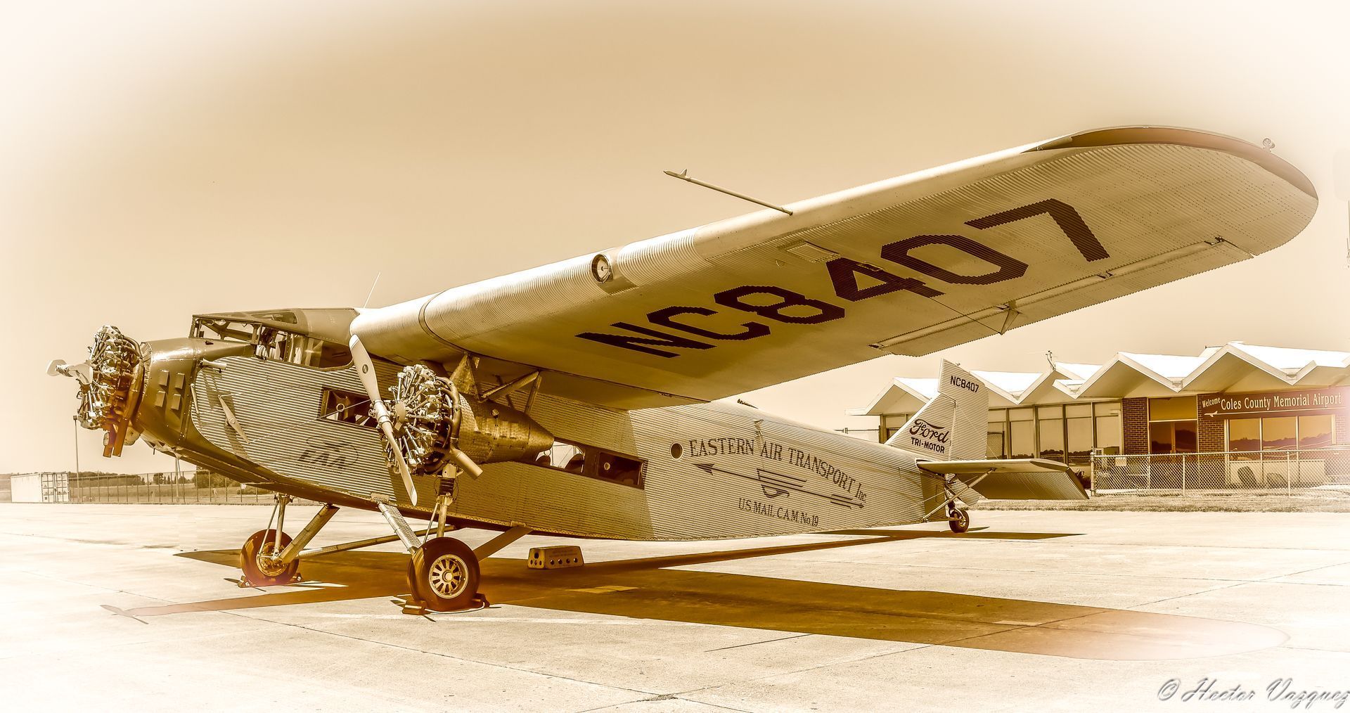 An old airplane with the numbers nc8407 on the wing