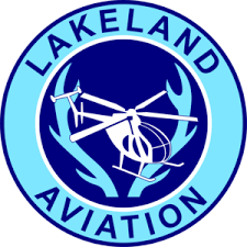 A logo for lakeland aviation with a helicopter in the center