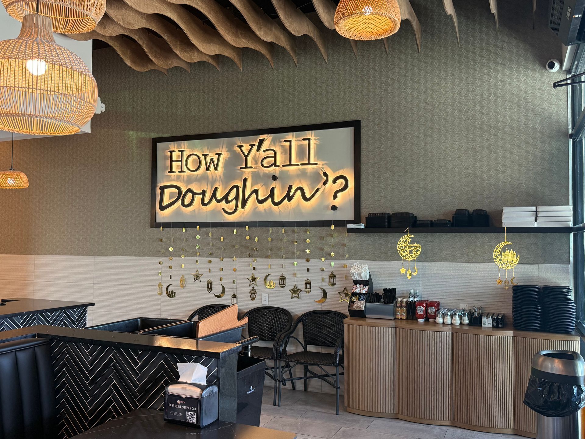 Golden, baked croissants arranged on a tray, close-up view.