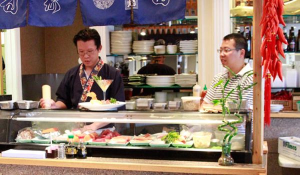 Two people in kitchen