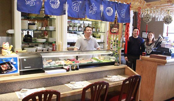 Two people in kitchen