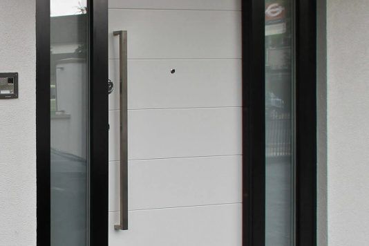 White armored security door with sidelight windows