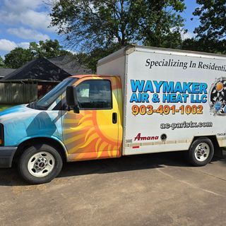 A waymaker air and heat truck is parked in a parking lot