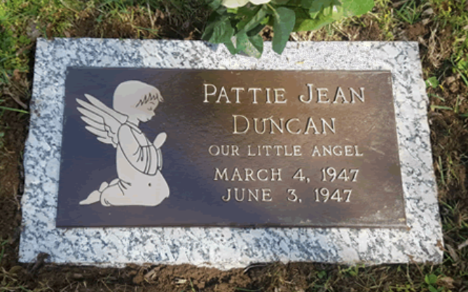 A bronze and granite headstone for Pattie Jean Duncan, reading 