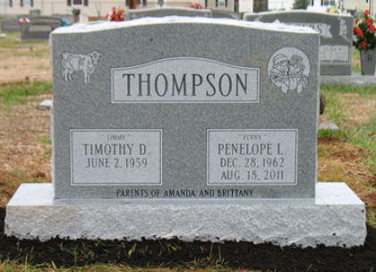 A gray granite headstone for Timothy and Penelope Thompson, engraved with names, dates, and the text 