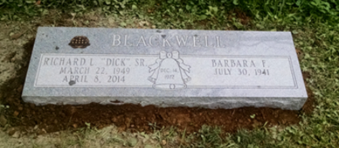A granite grave marker for Richard L. 