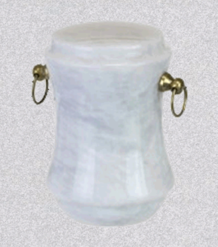 A white marble cremation urn with a tapered shape and gold-colored metal ring handles on the sides.