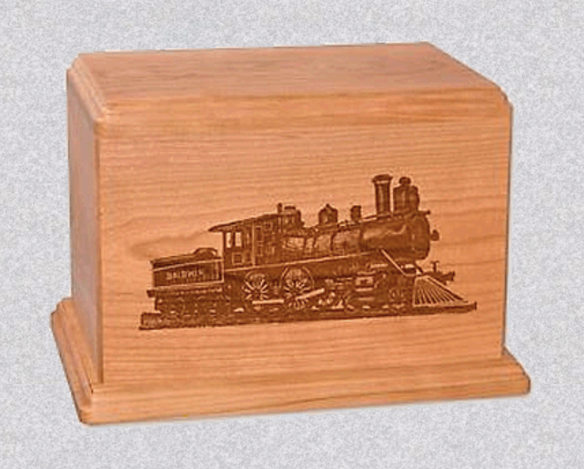 A light wood rectangular urn with an engraved vintage steam locomotive on the front panel.