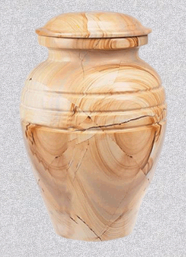 A light-colored wooden cremation urn with a smooth, polished finish and natural grain patterns, set against a gray background.