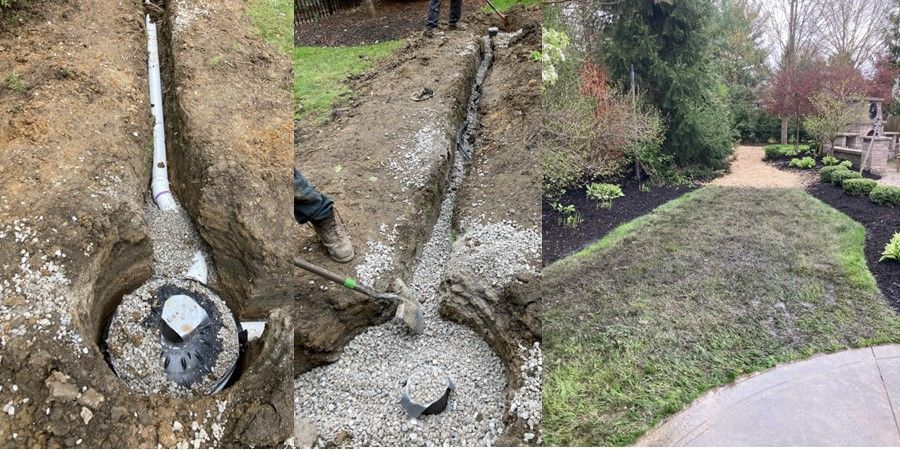 A drainage system is being installed in a yard.