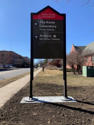 Sign for Iowa State University with directions: Ames Laboratory and Armory.