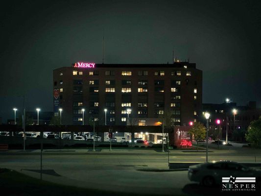 Hospital at night, lit with 