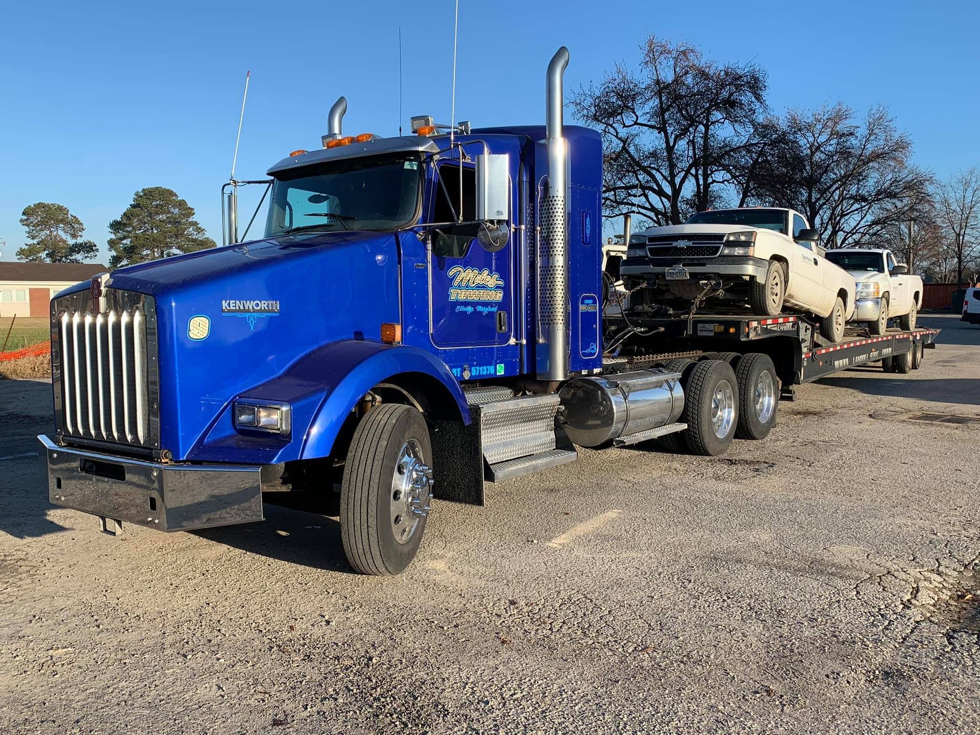 Miles Towing logo