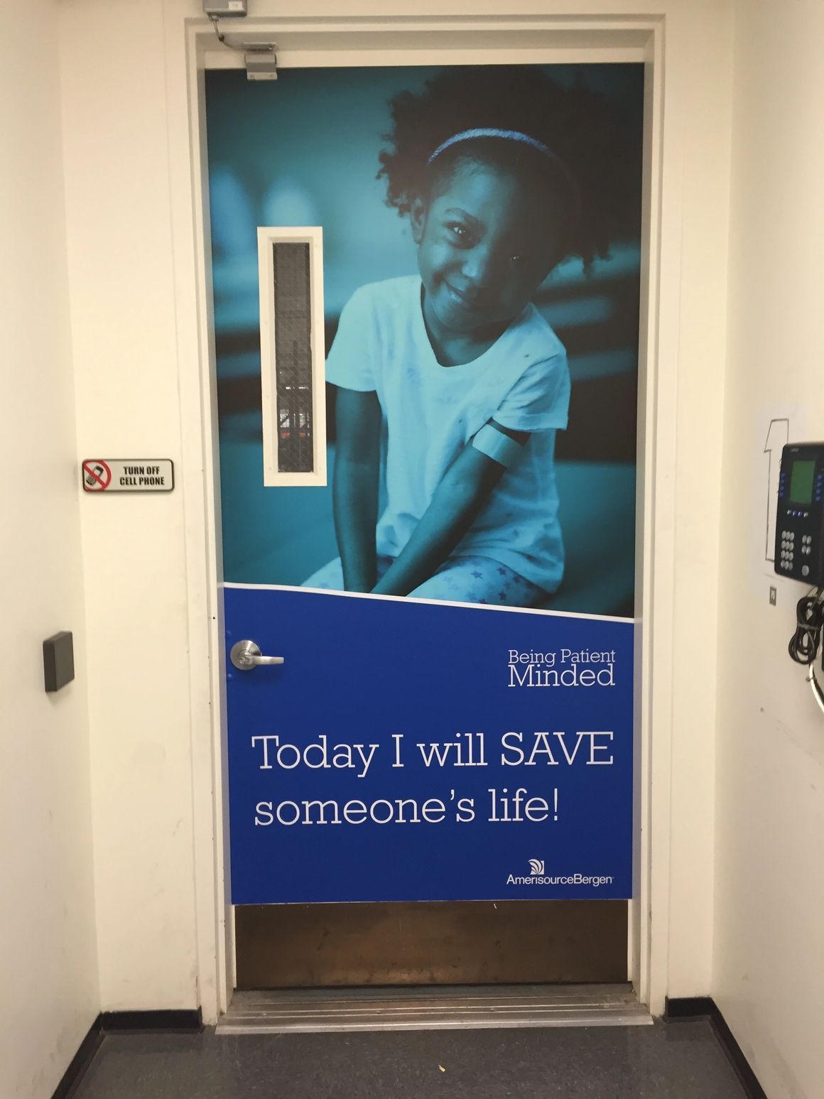 A door featuring a photo of a smiling child and the text: 