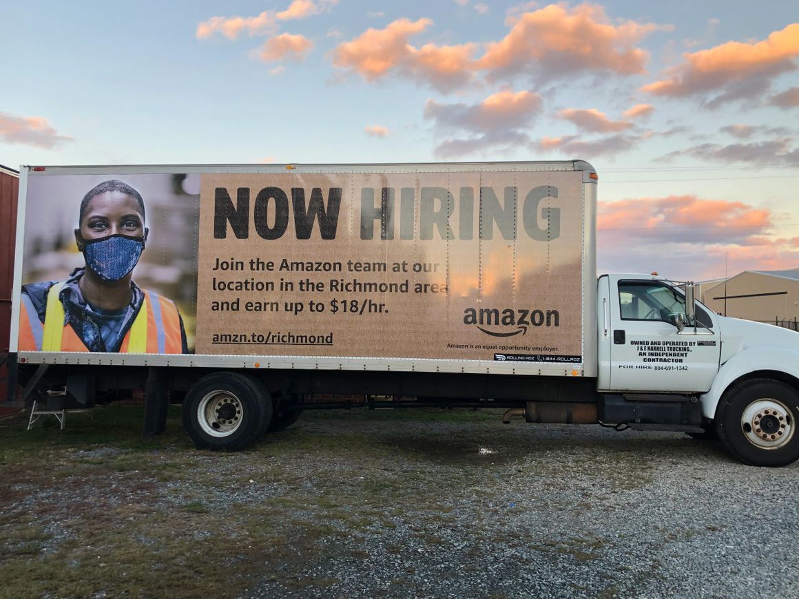 A white delivery truck with a 