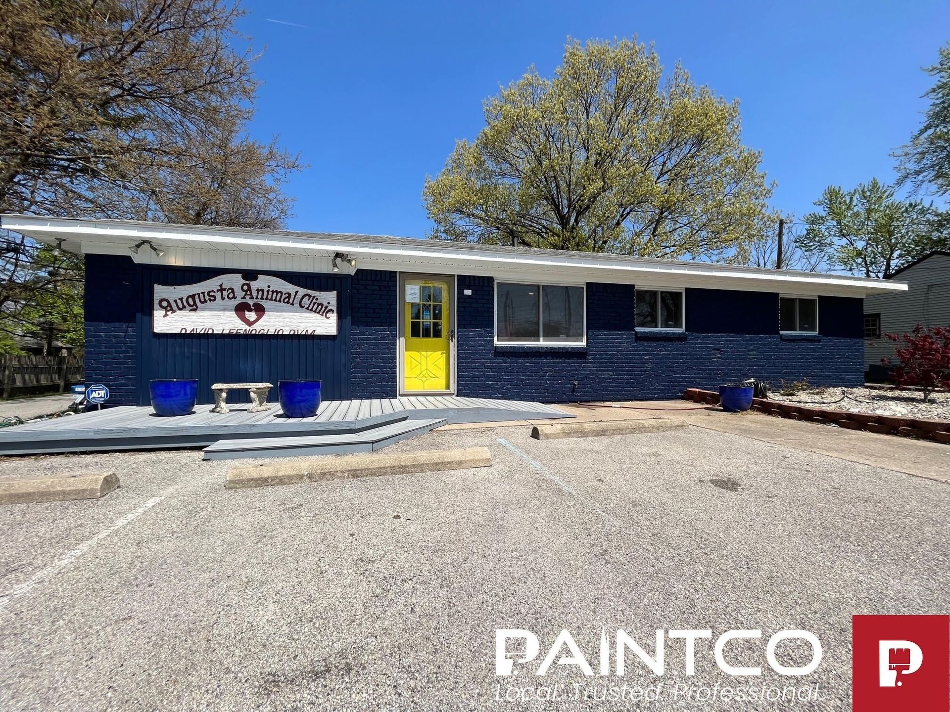 Blue building with yellow door; 