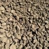A close up of a pile of rocks on the ground.