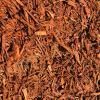 A close up of a pile of brown mulch.