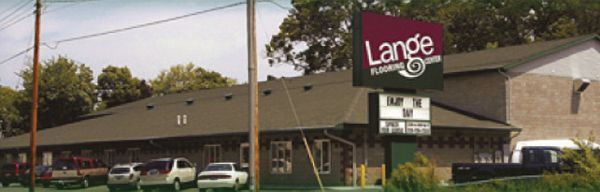 A large building with a large sign that says Lange on it.