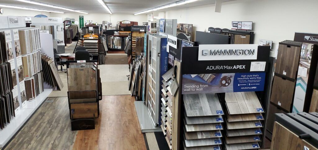 A large flooring store filled with lots of different types of flooring.
