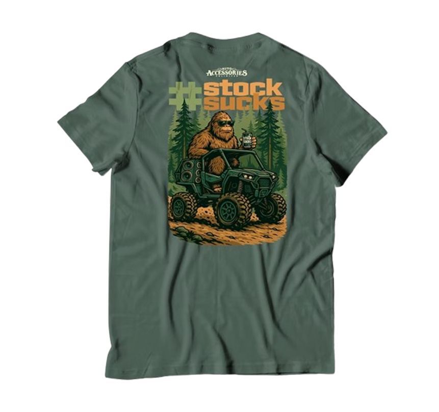Olive green T-shirt with a graphic of a man on a tractor and bold stock sucks text