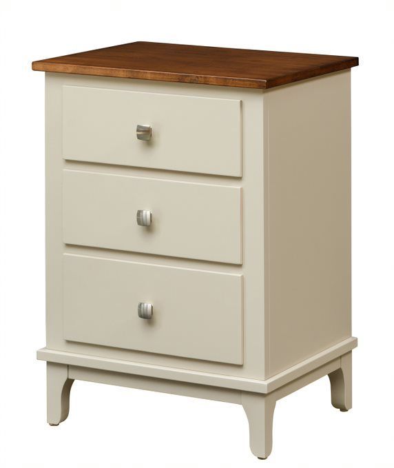 A white nightstand with three drawers and a wooden top