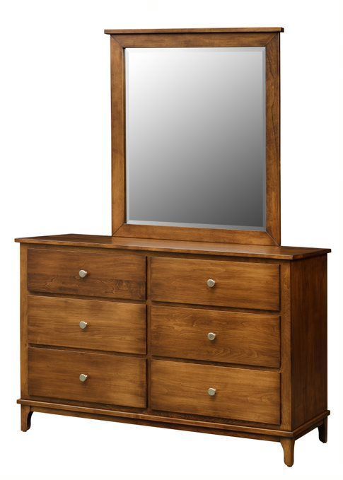 A wooden dresser with a mirror on top of it