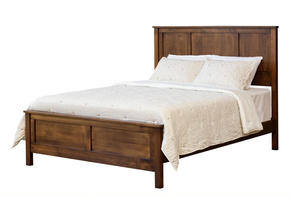 A wooden bed with white sheets and pillows on a white background