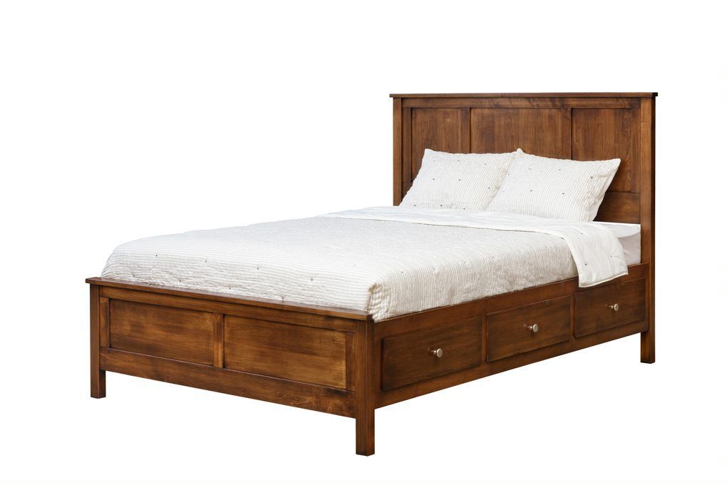 A wooden bed with drawers underneath it on a white background.
