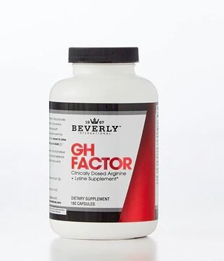 White bottle of Beverly International GH Factor supplement with red label and black cap.