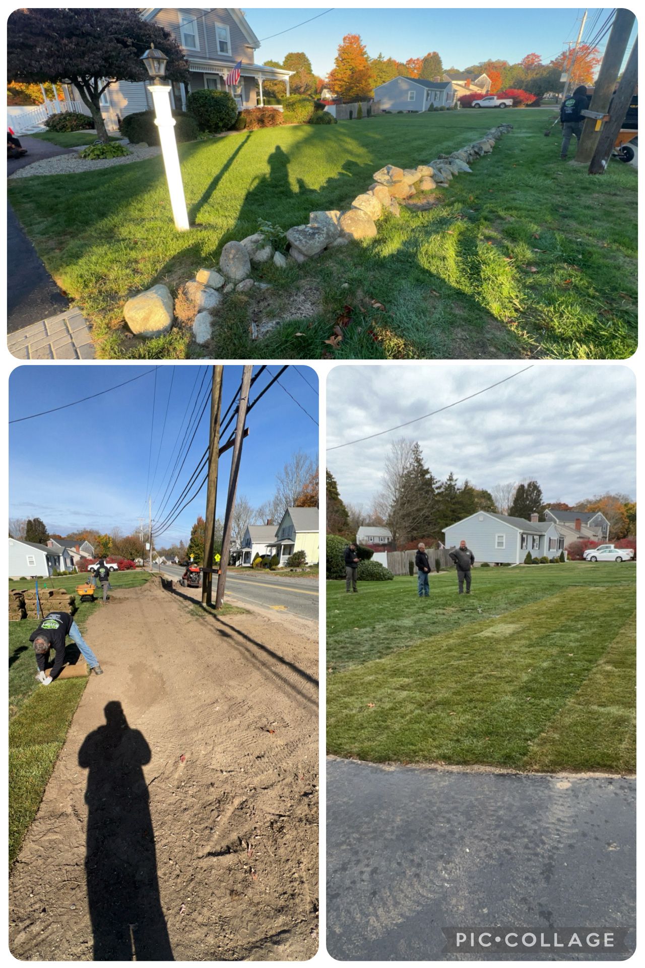 Lawn being worked on with stones and equipment. Men working on a sidewalk and grass on sunny day.