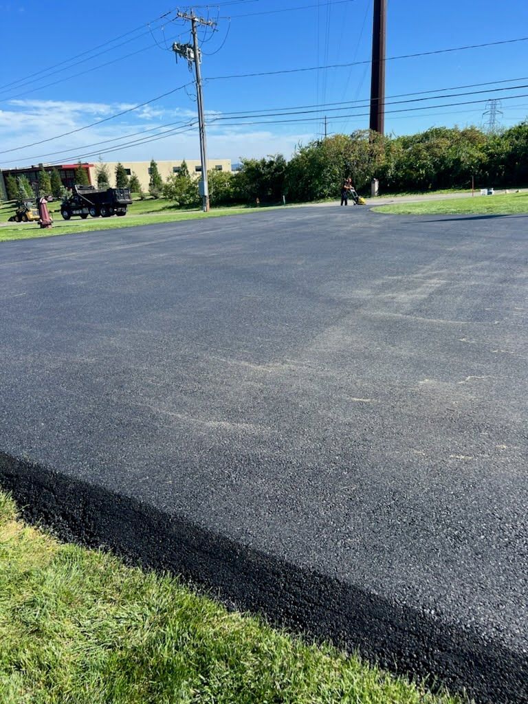 a parking lot with a truck parked on the side of it .