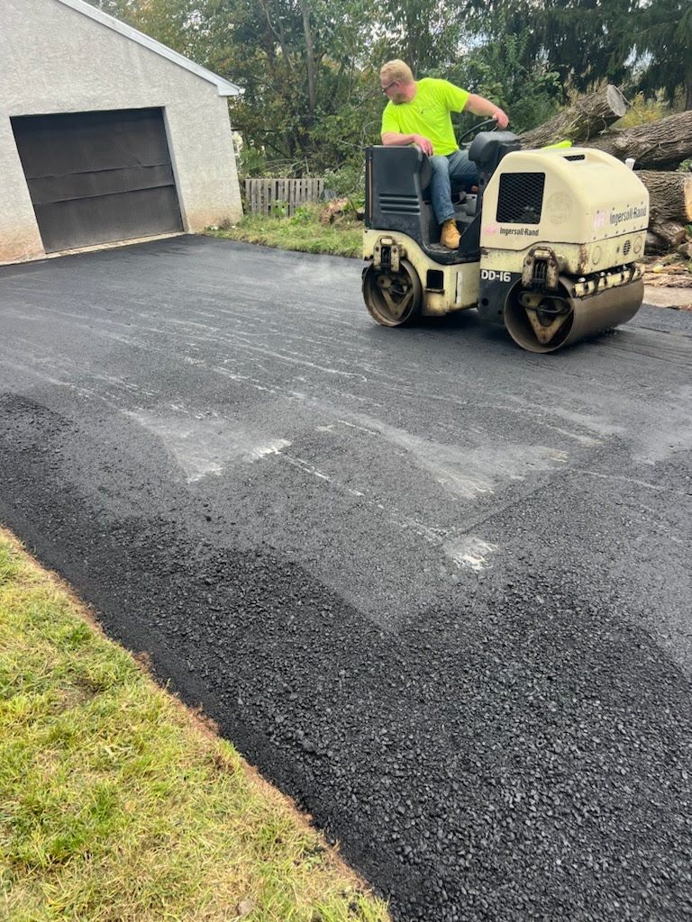 a man is riding a roller on a road .