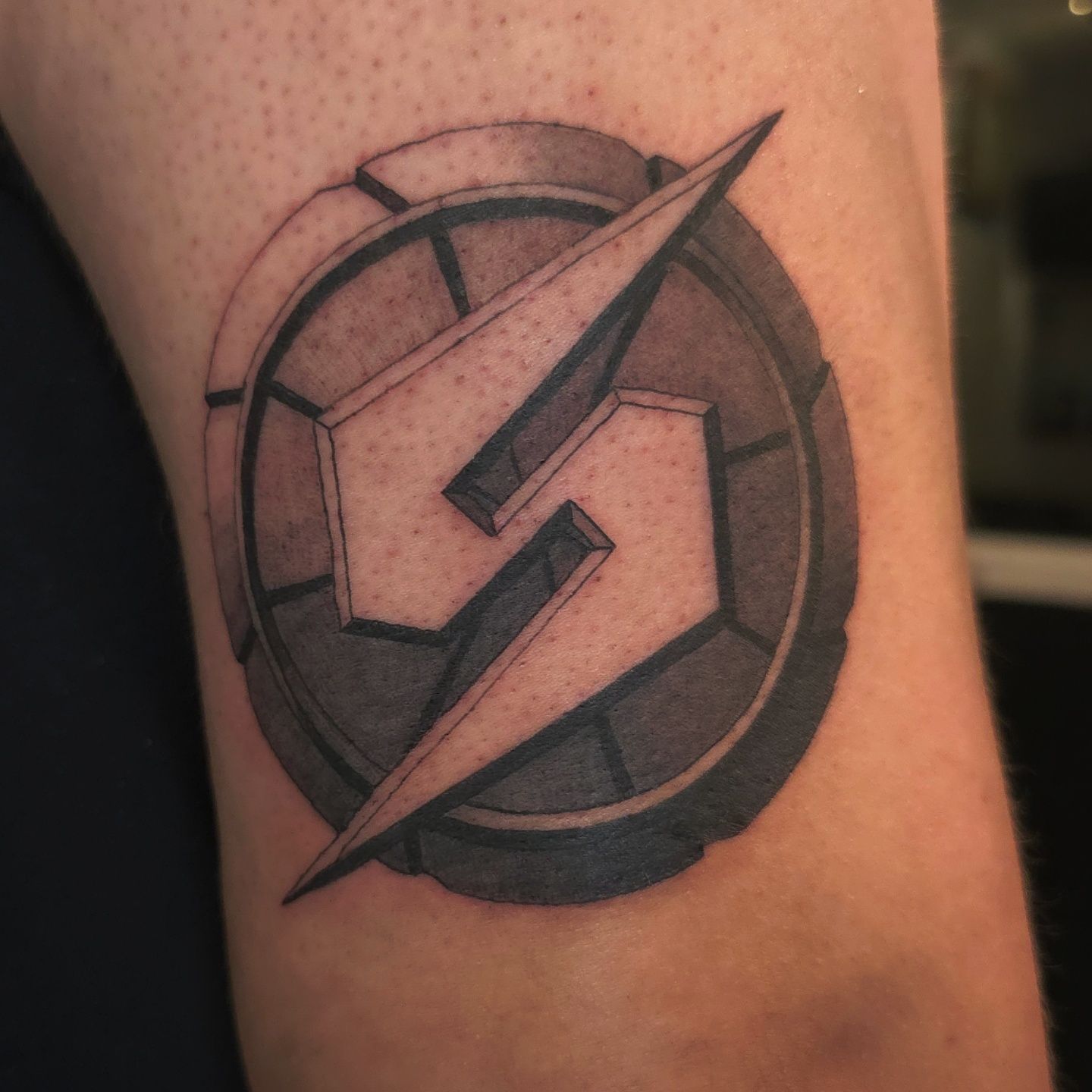 S logo tattoo