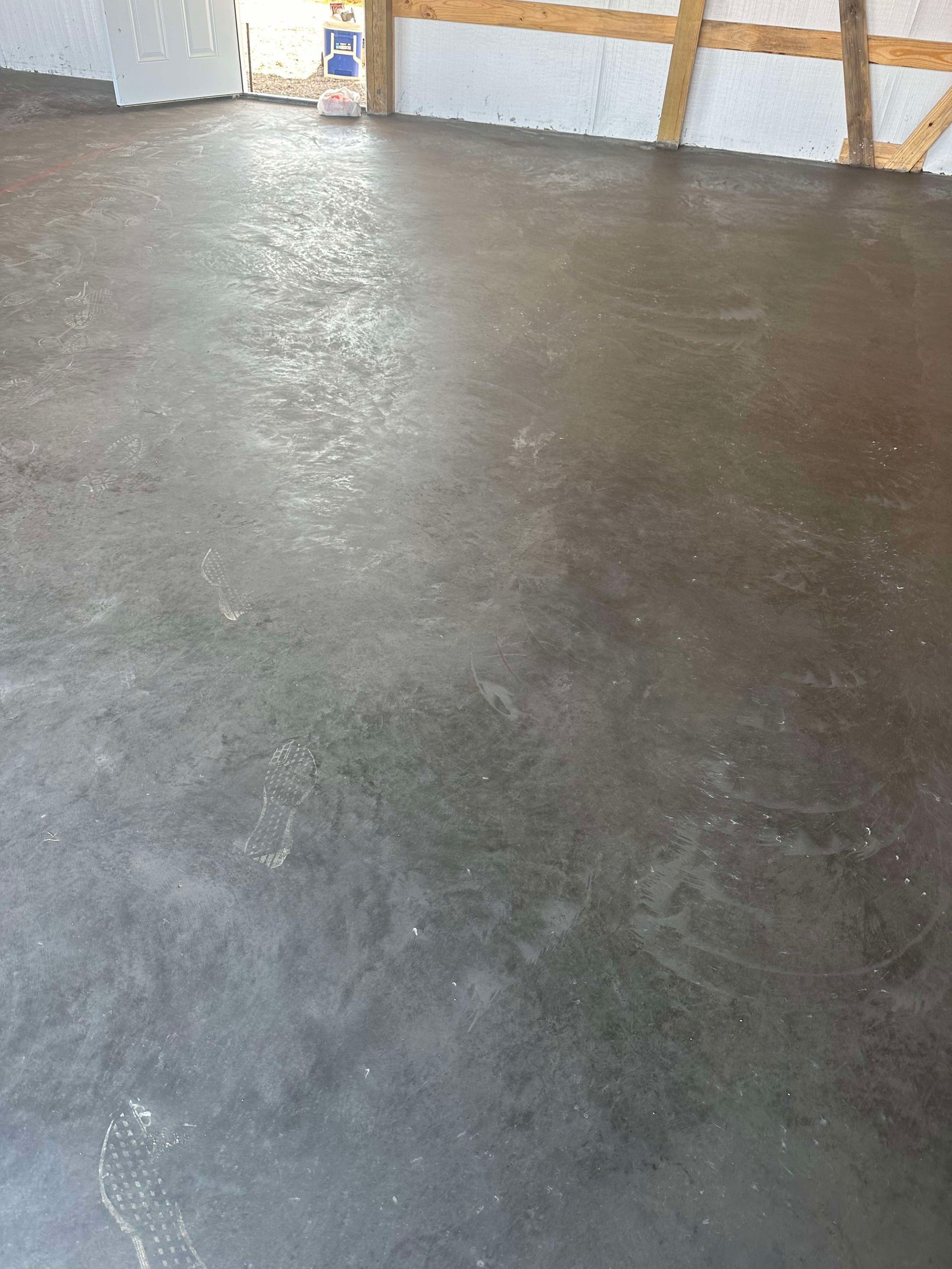 A close up of a concrete floor in a room.