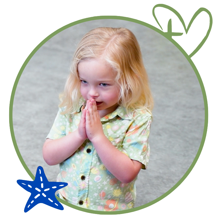 Blonde child in green floral shirt, hands clasped, in a green circle with a blue starfish and a green heart.