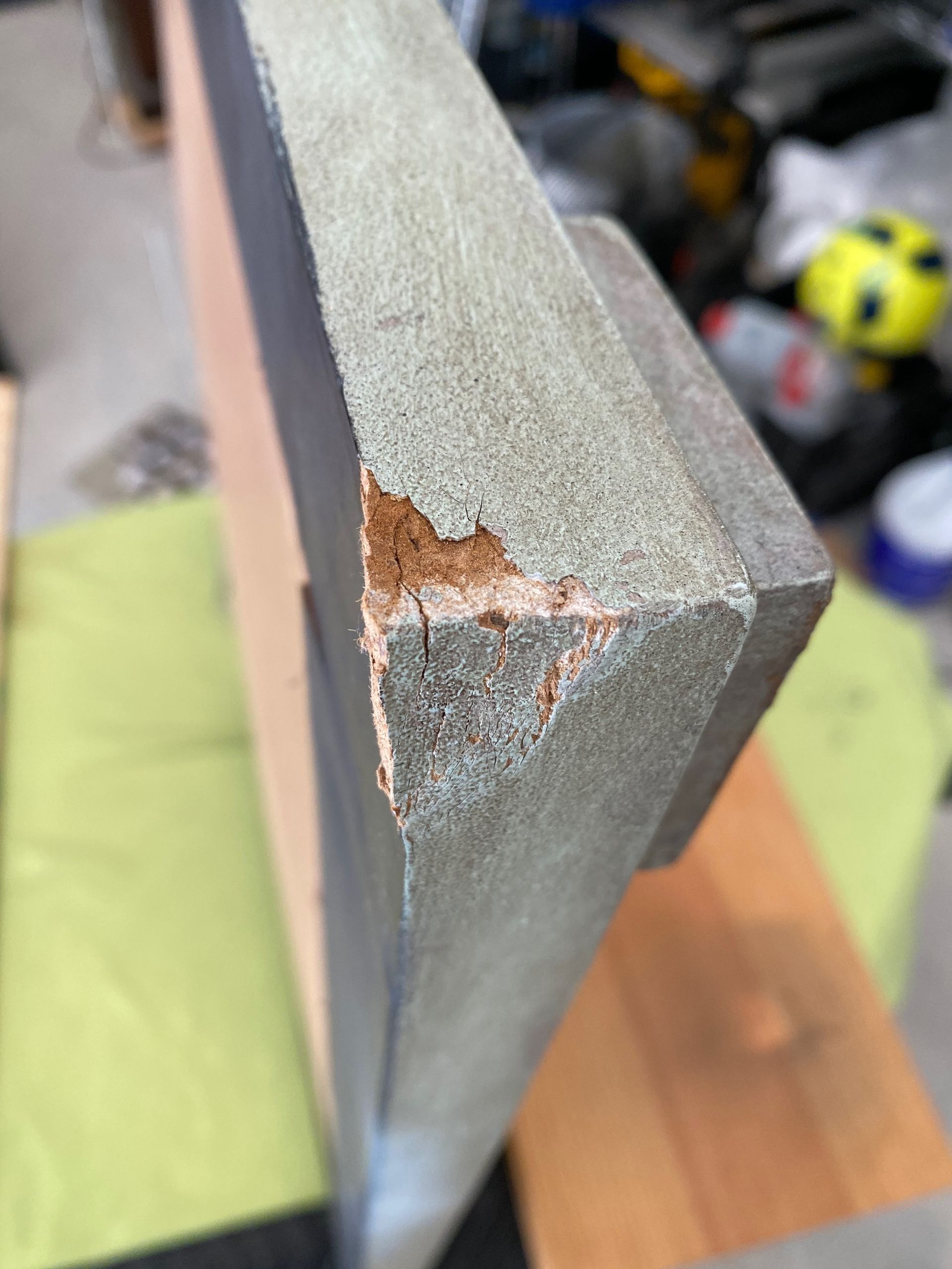 A piece of wood with a hole in it