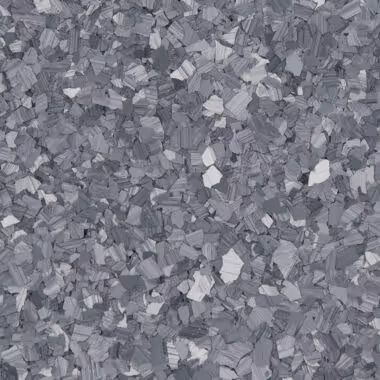 Gray and white speckled flooring, with irregular flakes.