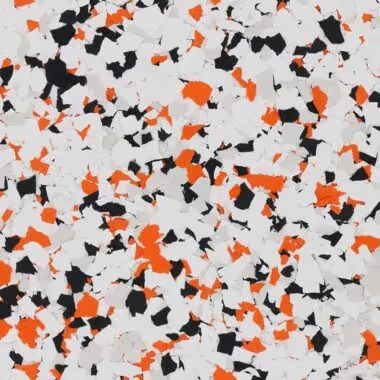 White, orange, and black speckled epoxy floor coating.