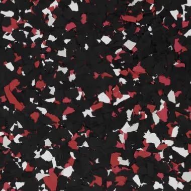 Black, red, and white speckled flooring, suitable for a garage or gym.