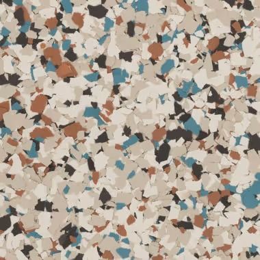 Speckled floor covering with tan, brown, blue, and black chips.