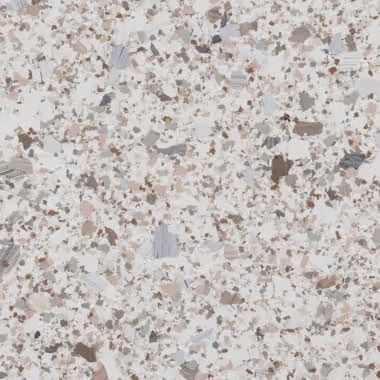 White speckled terrazzo pattern with tan, brown, and gray flecks.