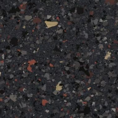 Dark, speckled surface with flecks of gray, red, and gold.