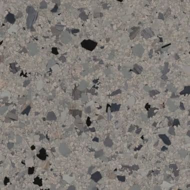 Gray terrazzo floor with varying sizes of dark and light chips.